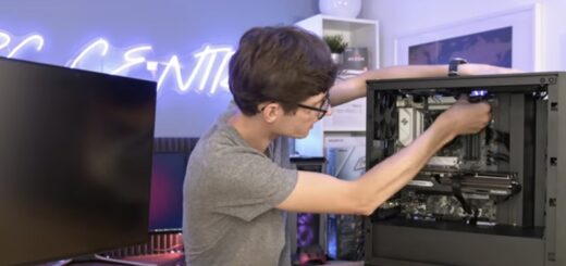 boy is fixing a computer