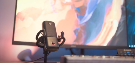 An image of a Wave 1 Microphone placed on a desk setup.